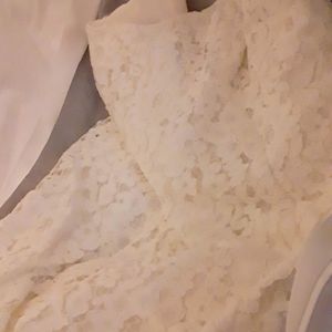 New wedding dress, veil and flower sash.